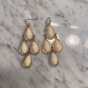 Gold and cream color earrings